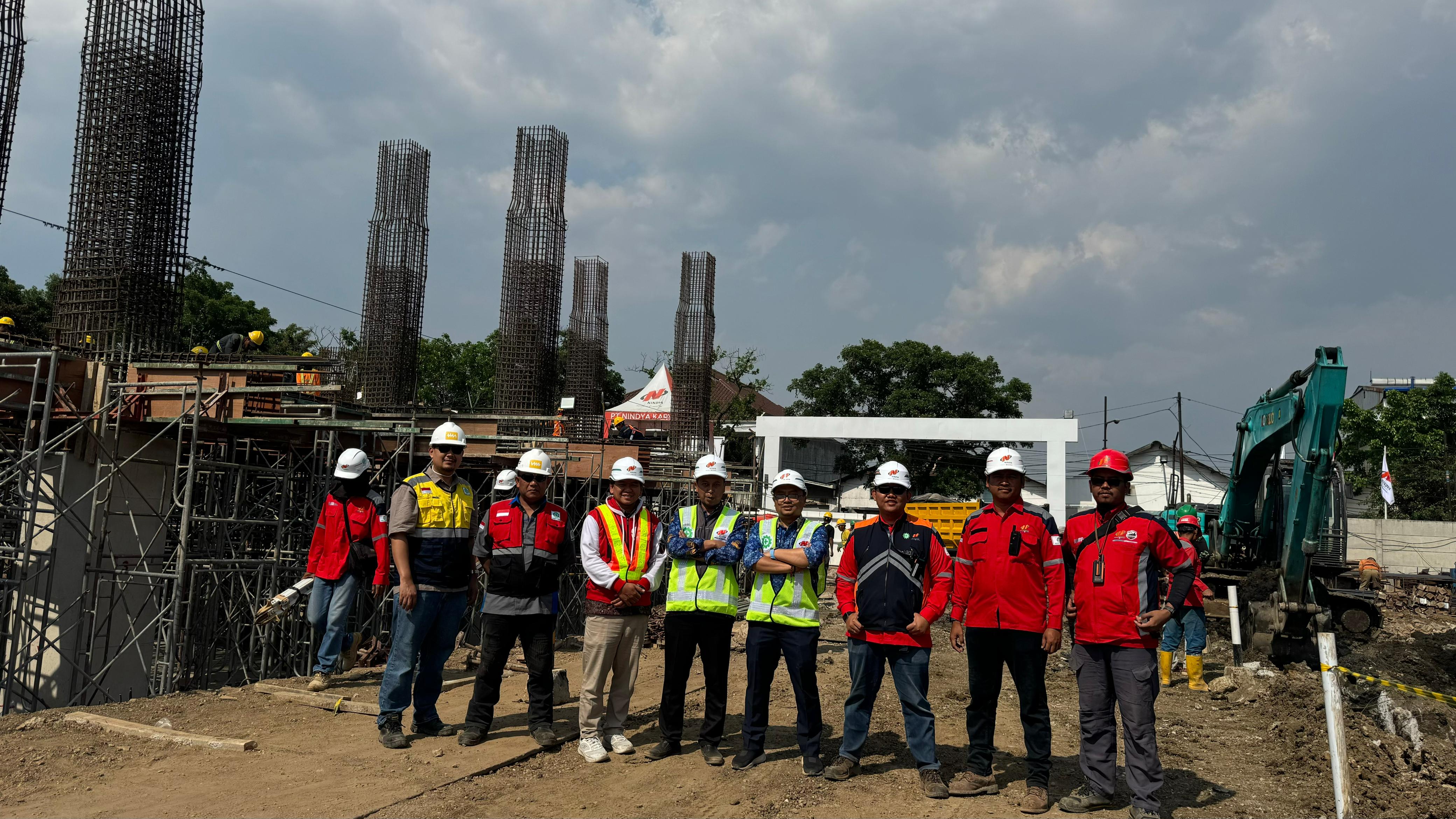 A construction site with cranes and building materials
